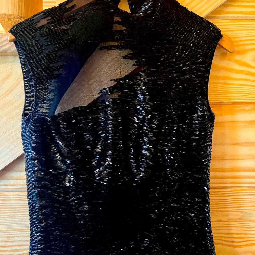 Jovani pageant dress. Black sequined with mess top.